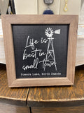 Life is best in a small town Powers lake sign