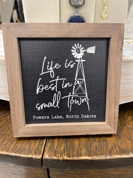 Life is best in a small town Powers lake sign