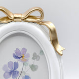 White Oval Picture Frame with Gold Bow Accent, 5x7